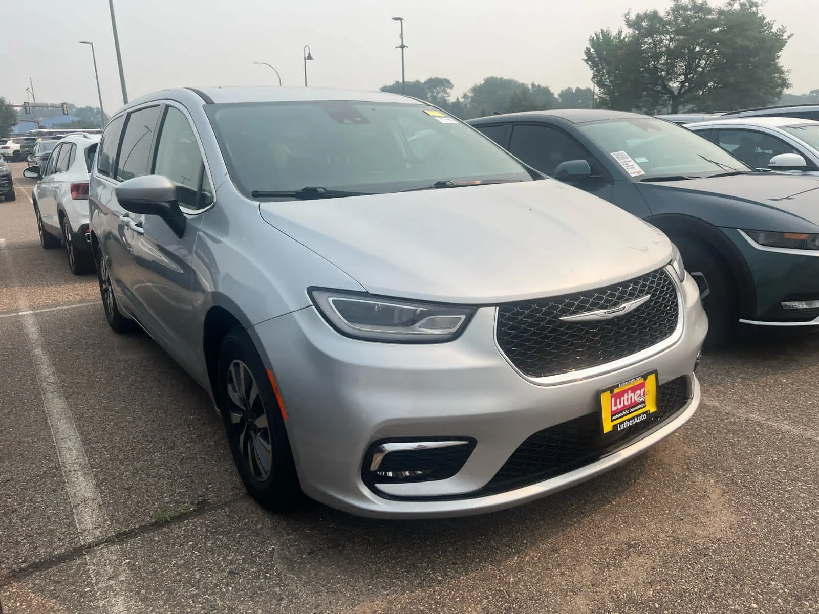 Used 2023 Chrysler Pacifica Hybrid Touring L with VIN 2C4RC1L70PR556192 for sale in Brooklyn Center, Minnesota