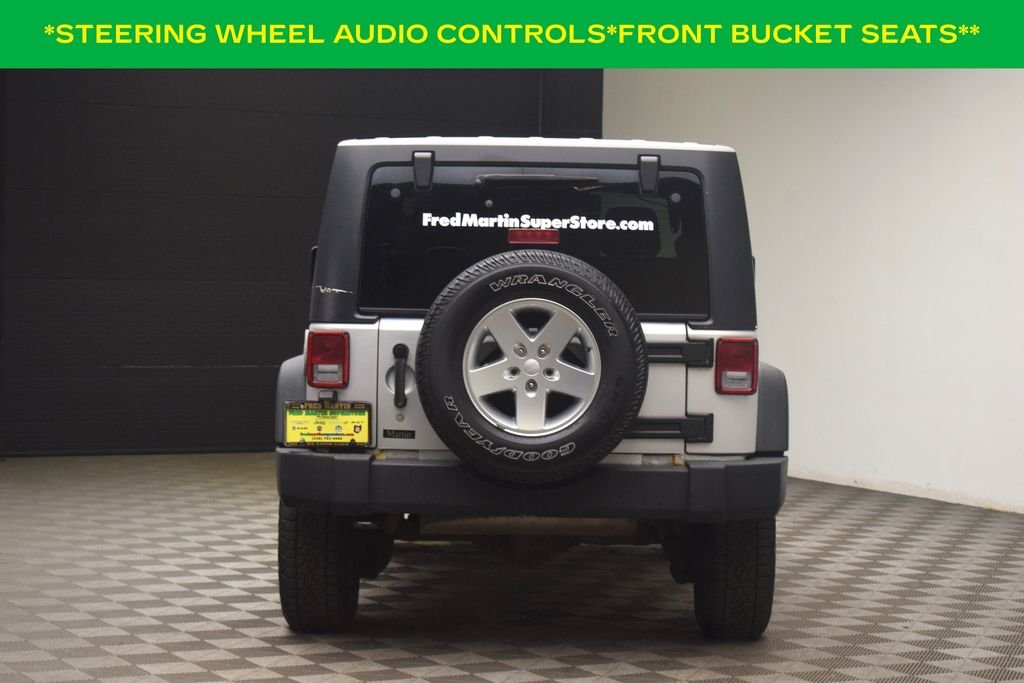 Used 2012 Bright Silver Metallic Clearcoat Jeep Sport image 6