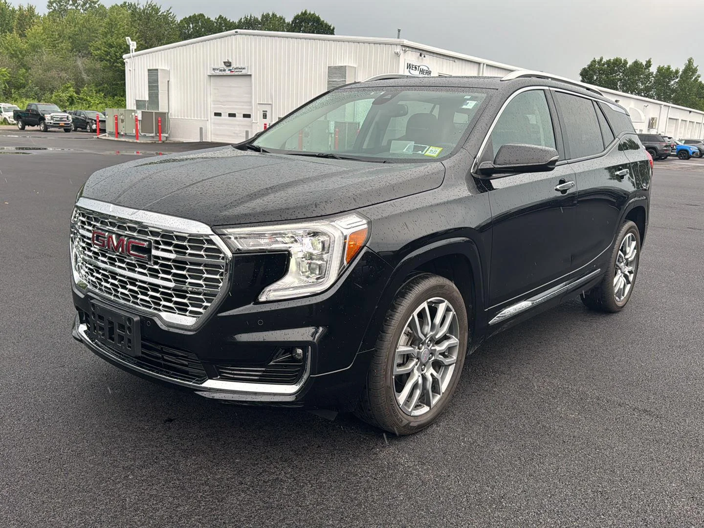 Used 2024 Ebony Twilight Metallic GMC Denali image 9