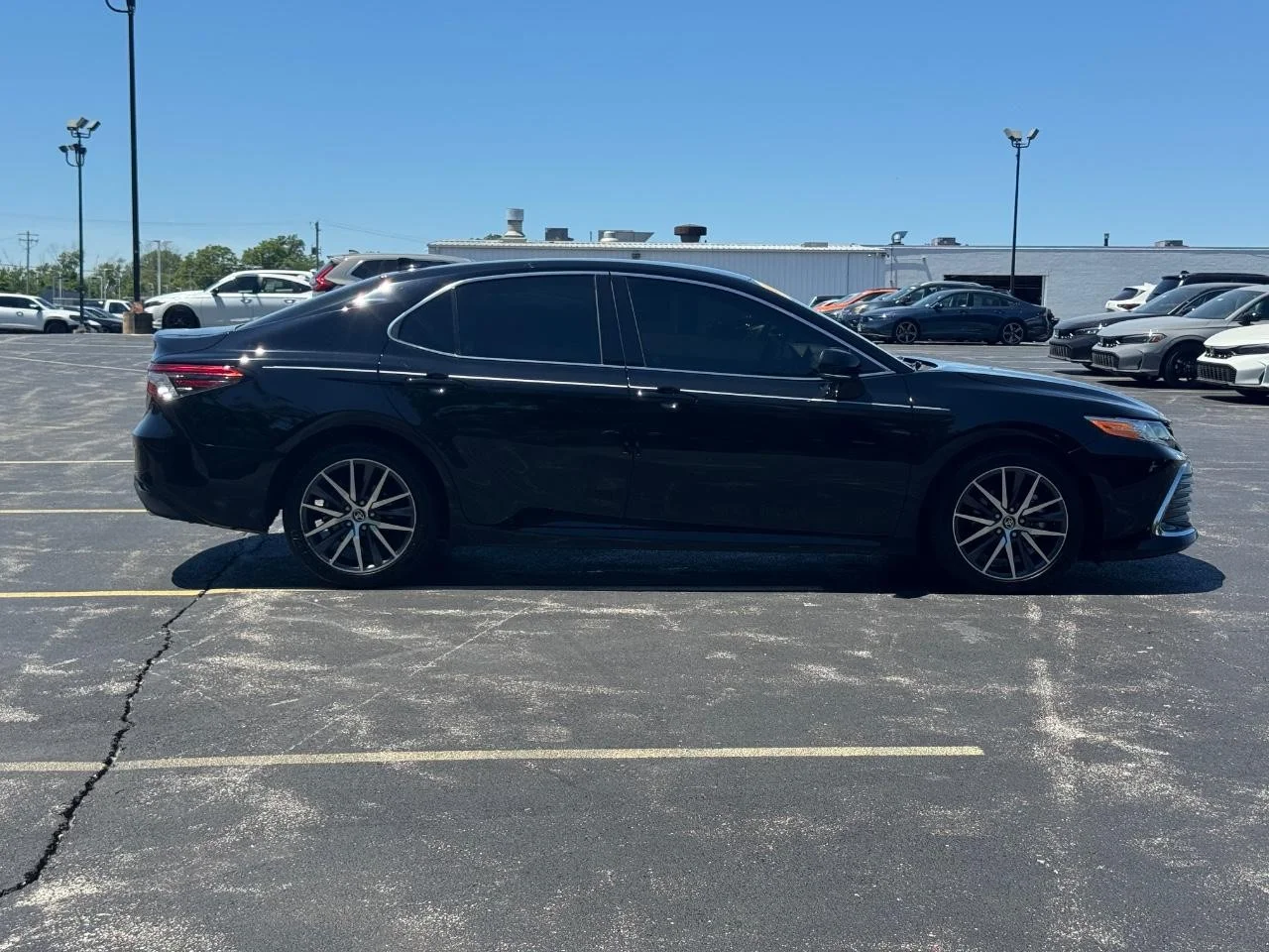 Used 2024 Midnight Black Metallic Toyota XLE image 3