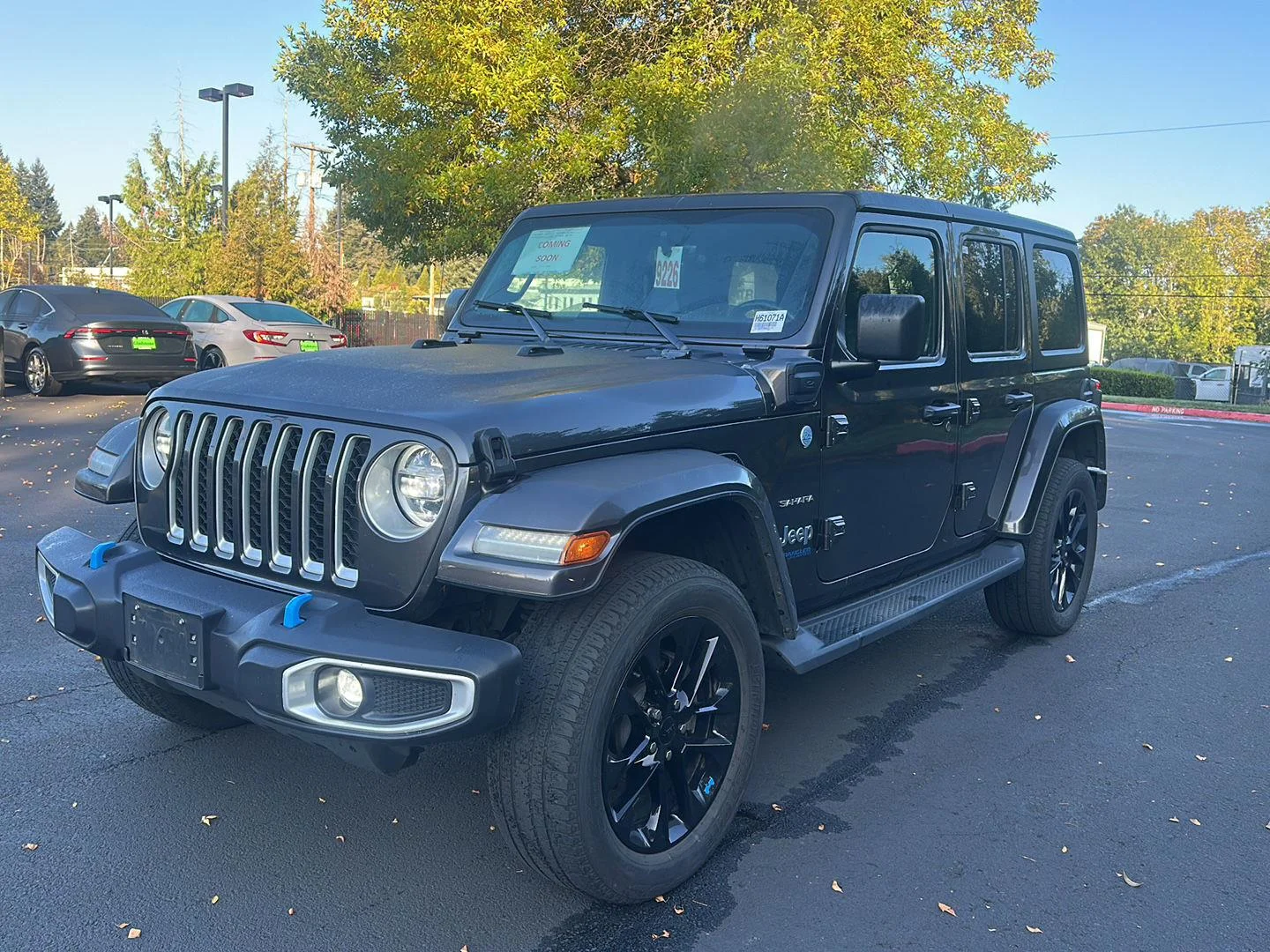 Used 2022 Granite Crystal Metallic Clearcoat Jeep Unlimited Sahara image 1