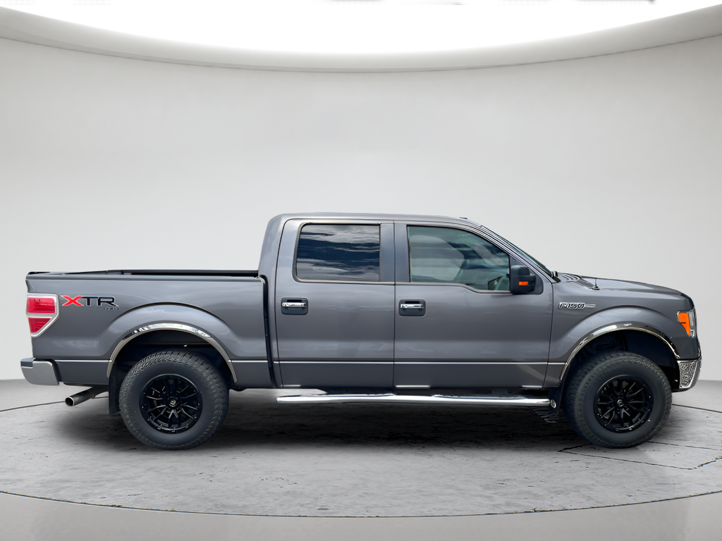 Used 2013 Tuxedo Black Metallic Ford XLT image 4