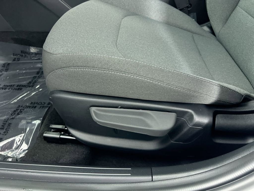 New 2026 Snow White Pearl Kia LX image 14