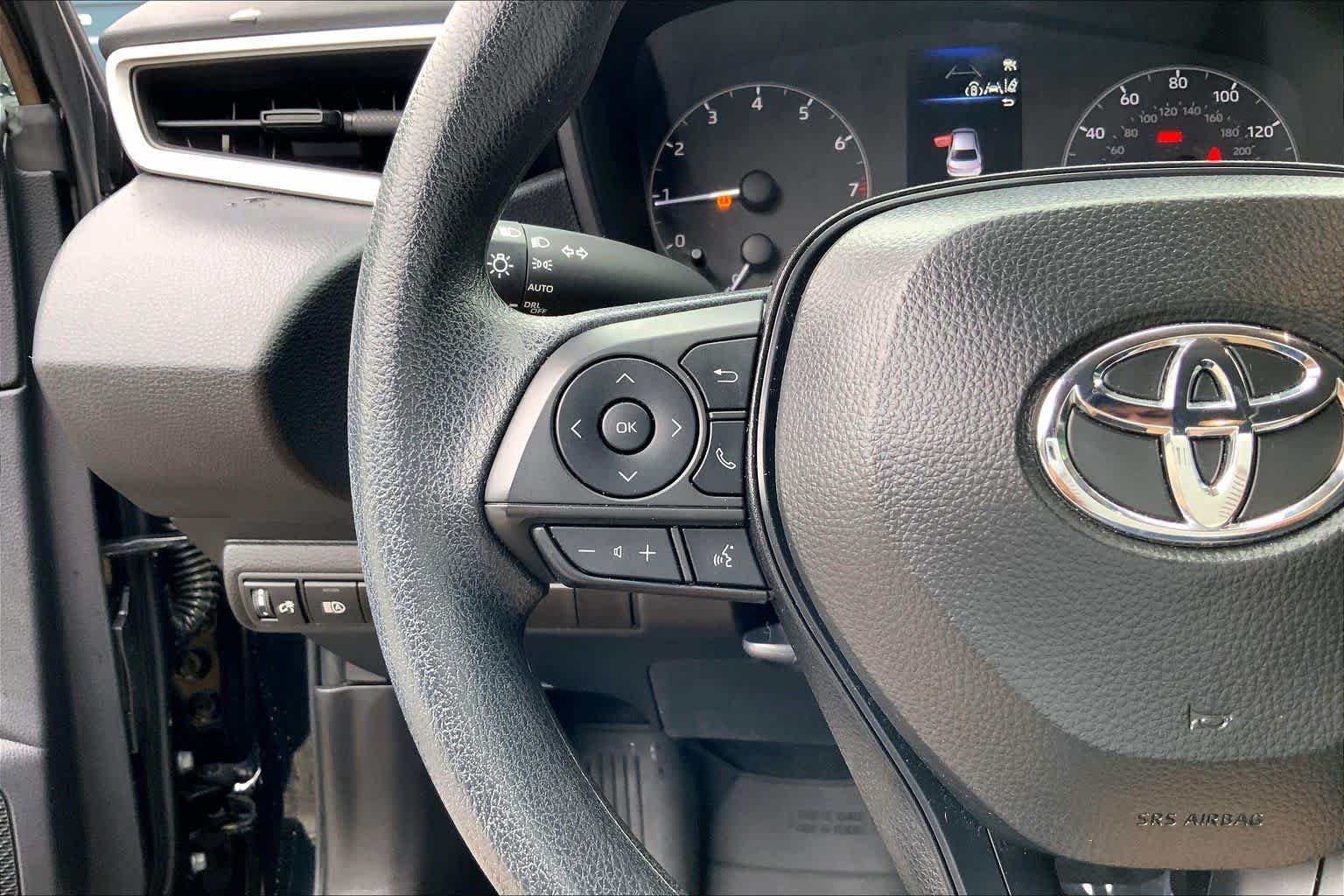 Used 2025 Midnight Black Metallic Toyota LE image 23