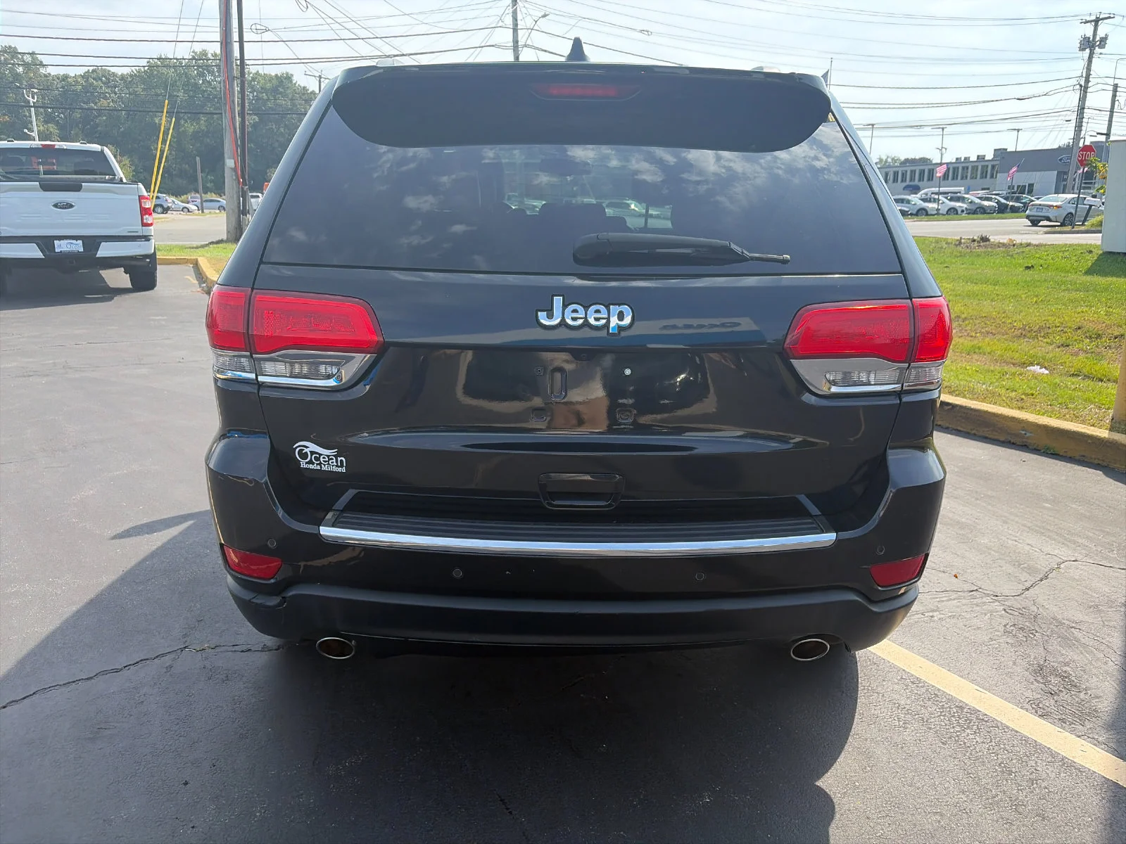 Used 2014 Brilliant Black Crystal Pearlcoat Jeep Limited image 4