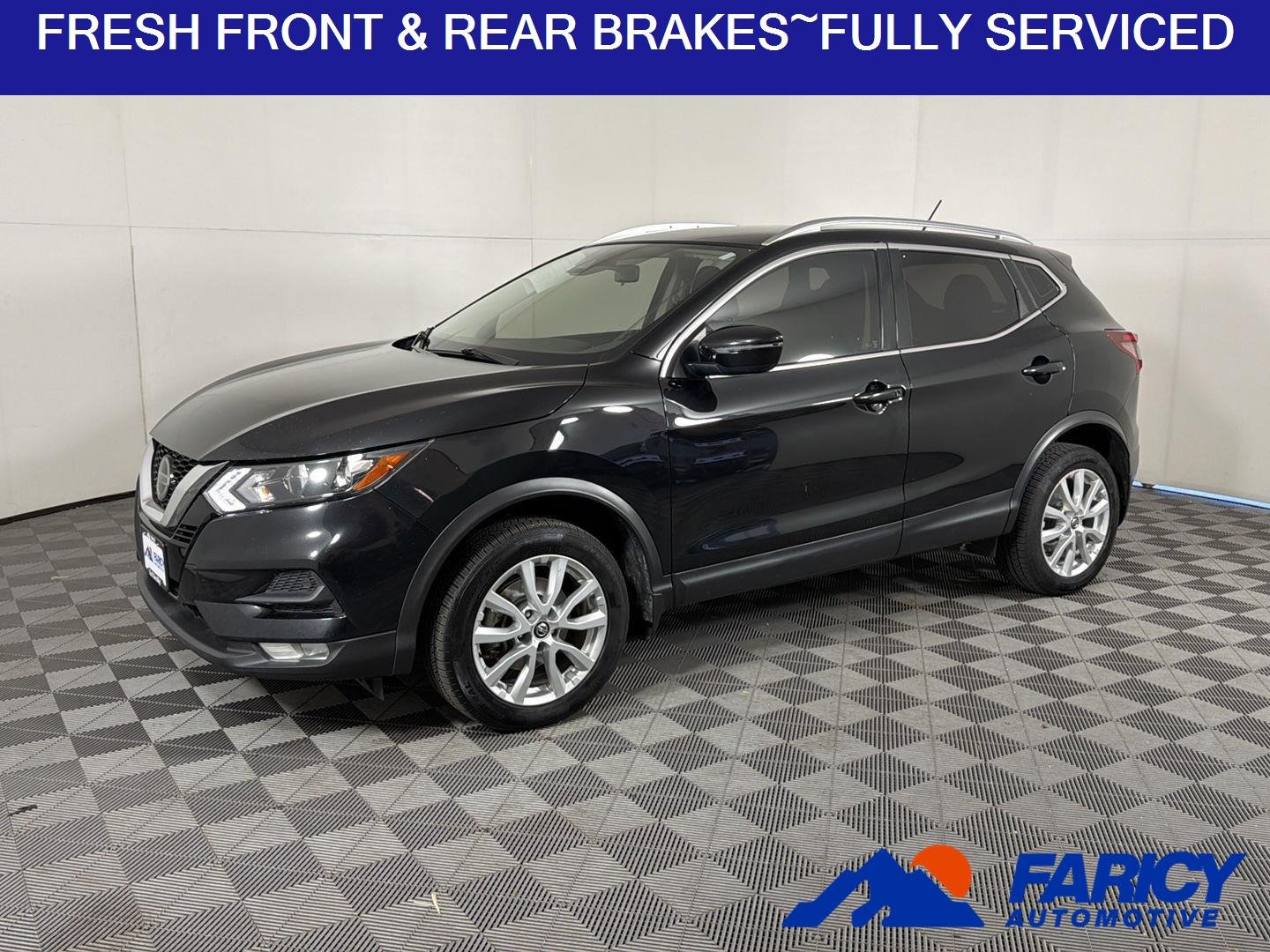 Used 2022 Magnetic Black Pearl Nissan SV image 1