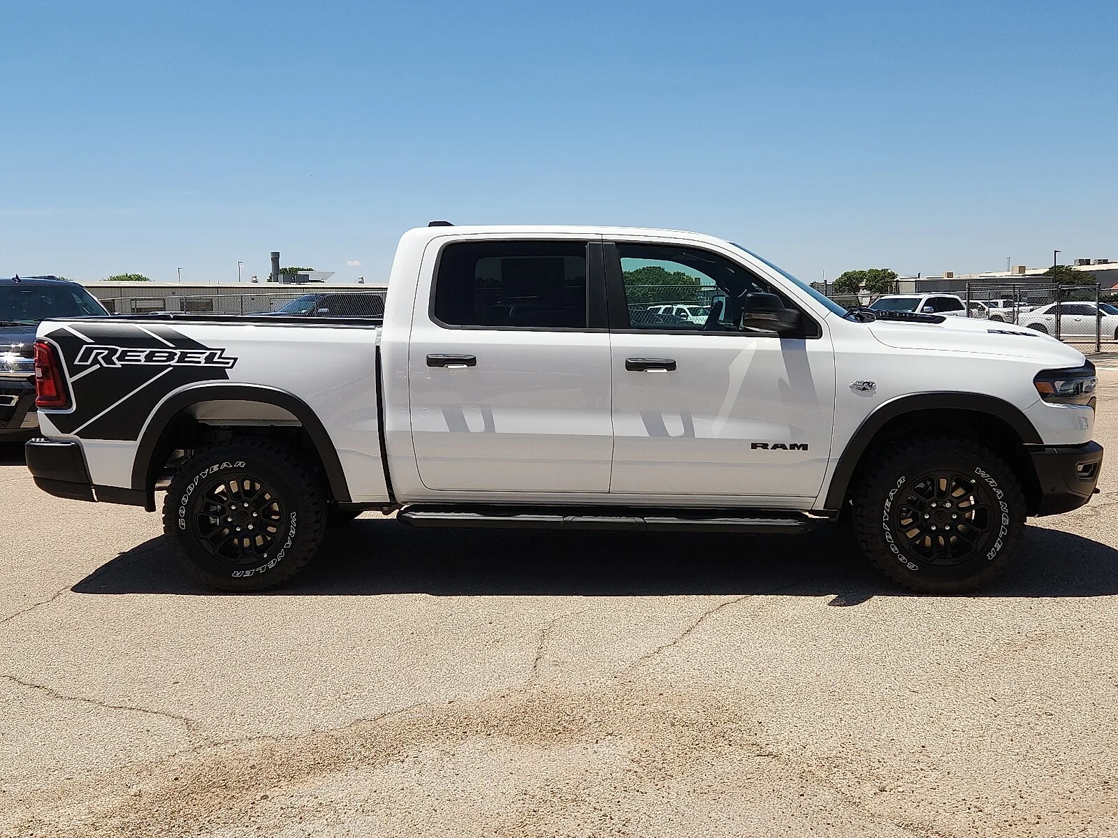 New 2026 Bright White Clear-Coat  Paint Ram REBEL CREW CAB 4X4 5