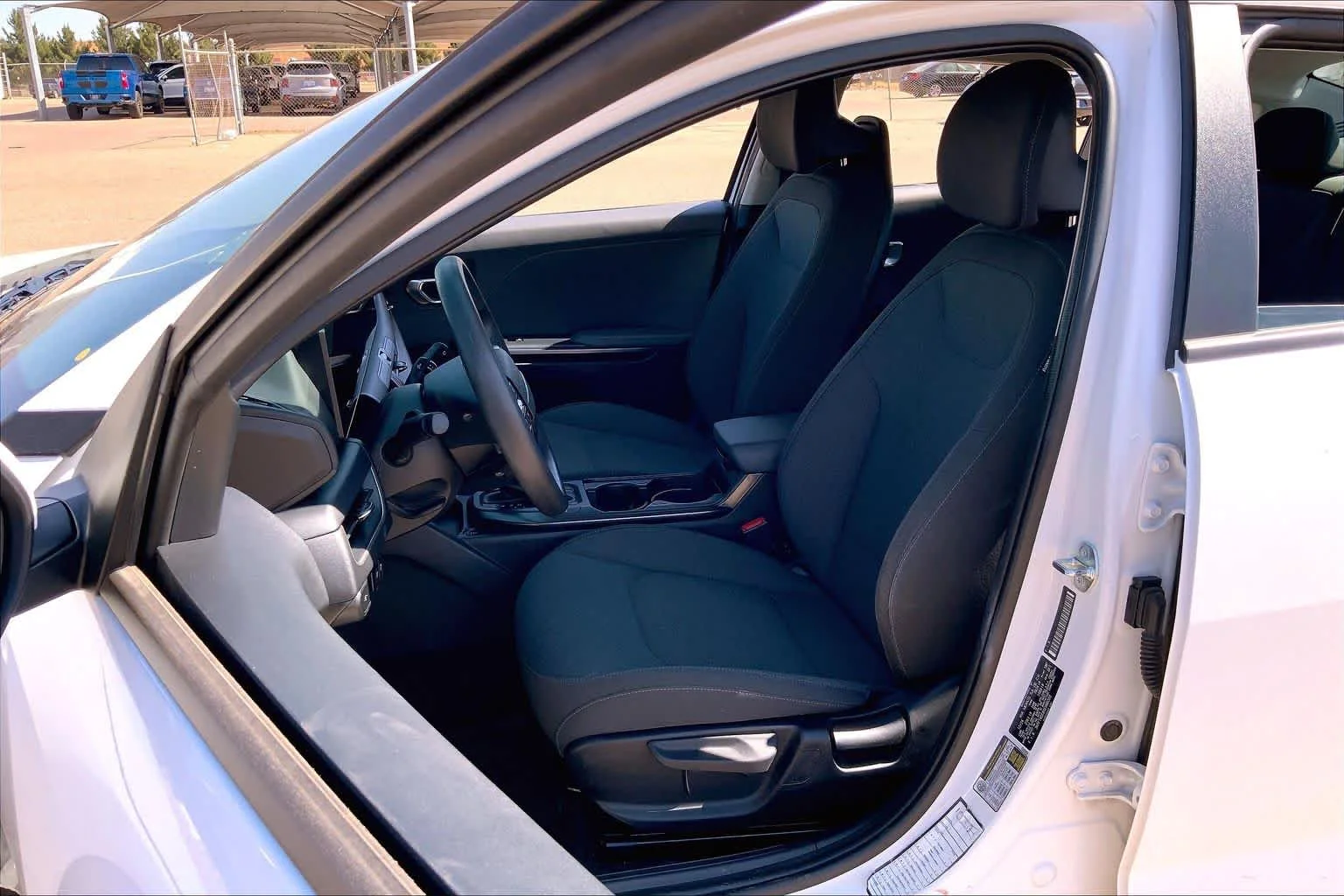 Used 2025 Snow White Pearl Kia LXS image 8