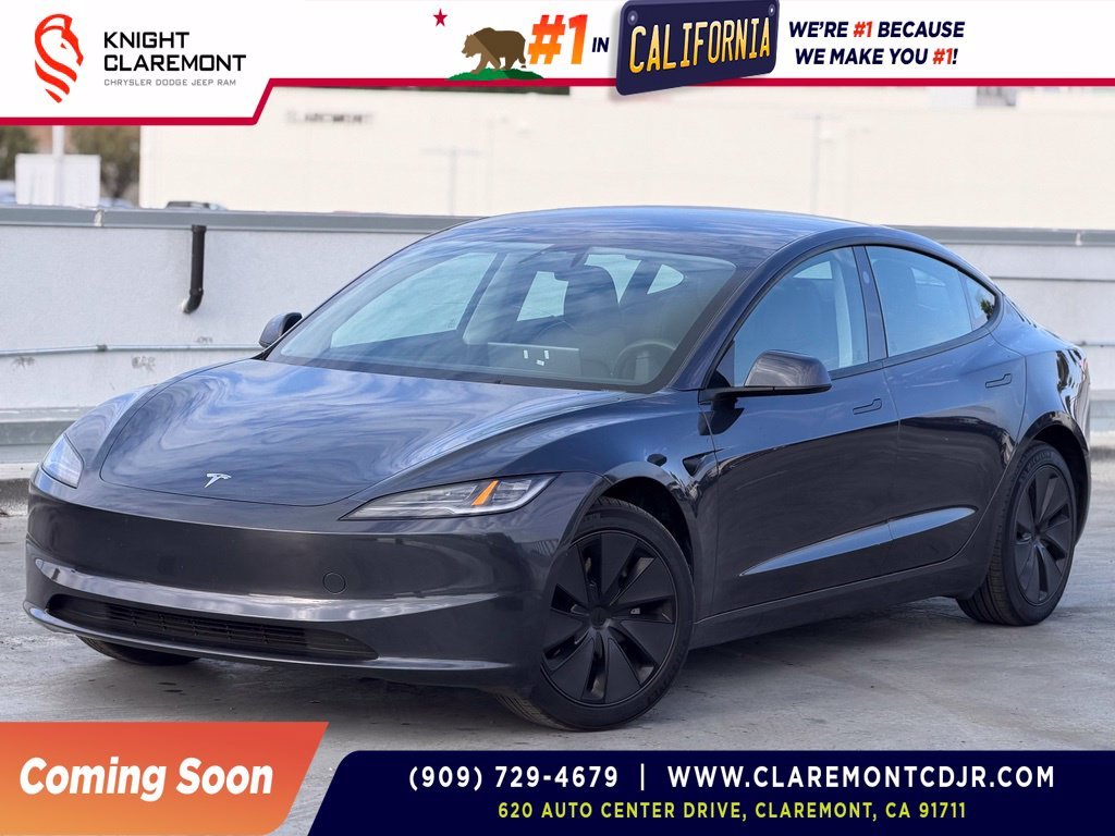 Used 2025 Stealth Gray Tesla  image 1