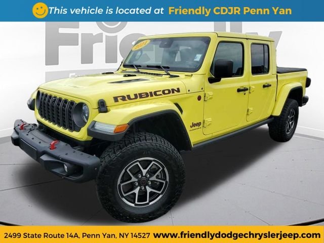 Used 2024 Yellow Jeep Rubicon image 1