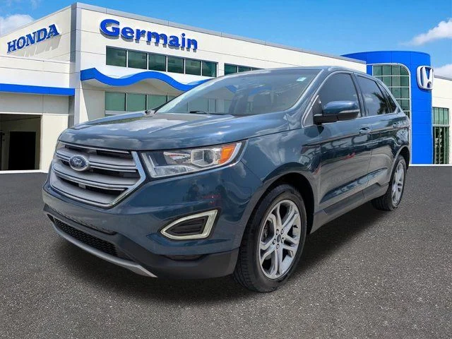 Used 2016 Blue Metallic Ford Titanium image 1