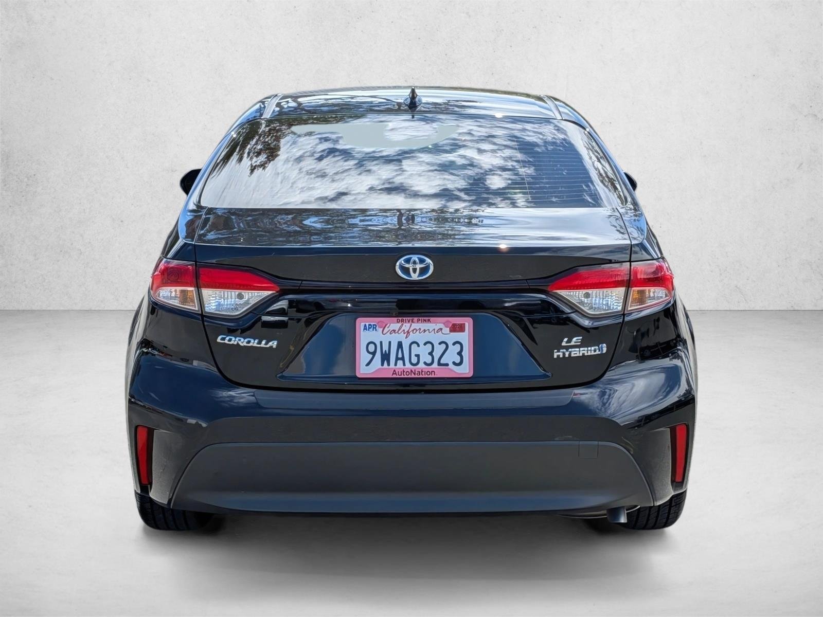 Used 2024 Midnight Black Metallic Toyota Hybrid LE image 7