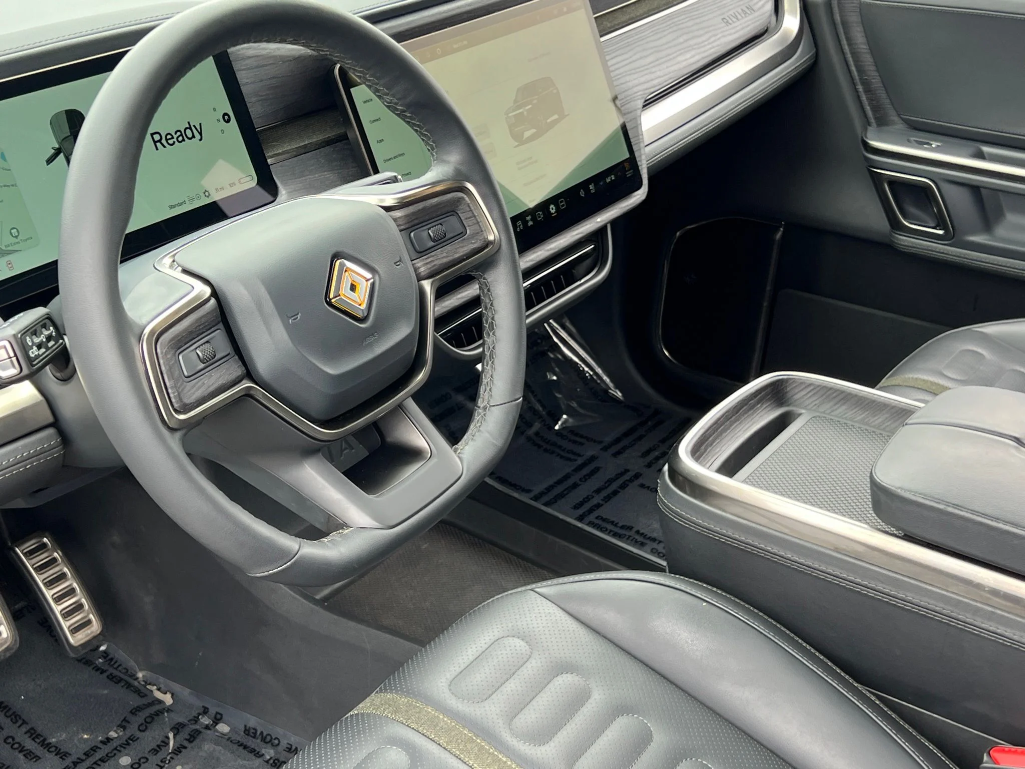 Used 2024 Black Rivian Adventure image 2