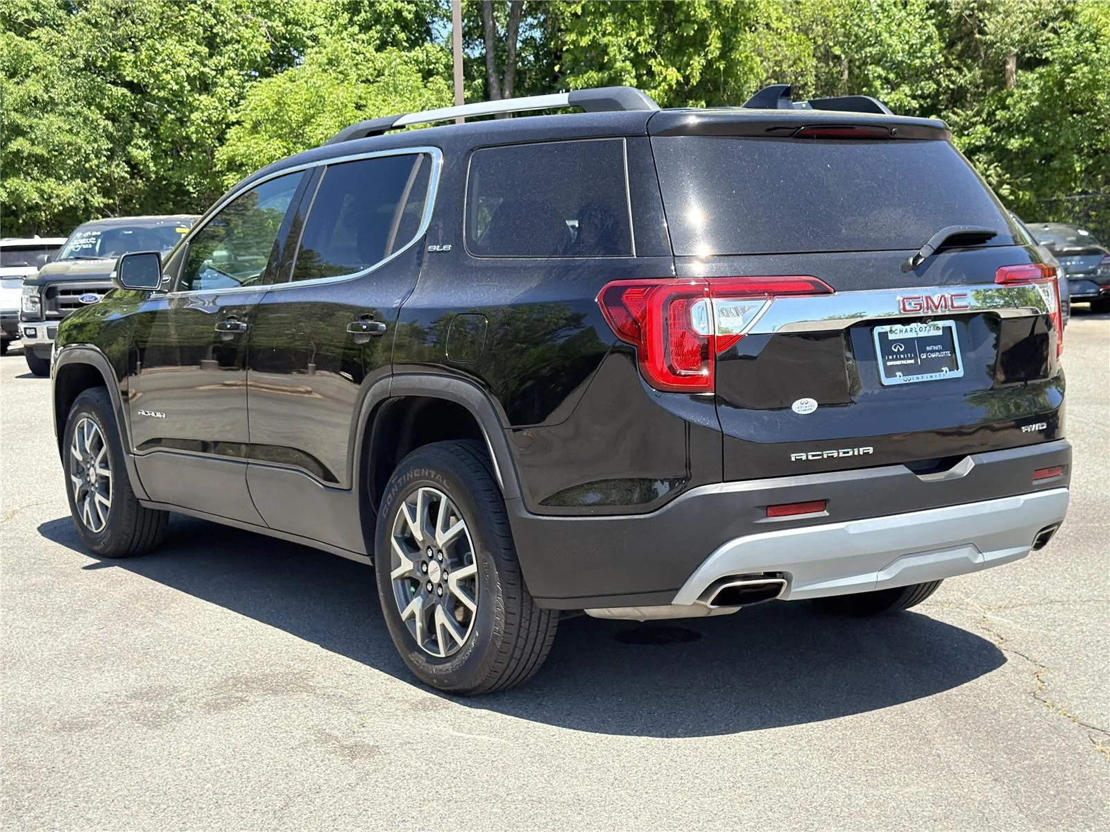 Used 2023 Ebony Twilight Metallic GMC SLE image 26