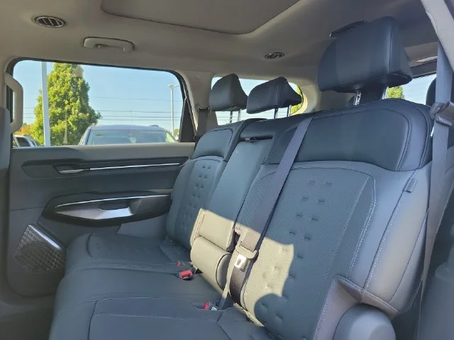 New 2026 Ivory Silver Kia Wind AWD image 9