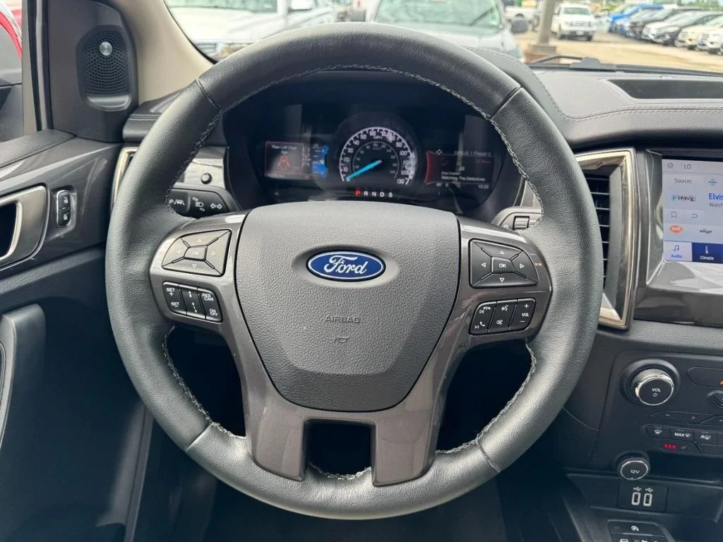 Used 2020 Rapid Red Metallic Tinted Clearcoat Ford Lariat image 12