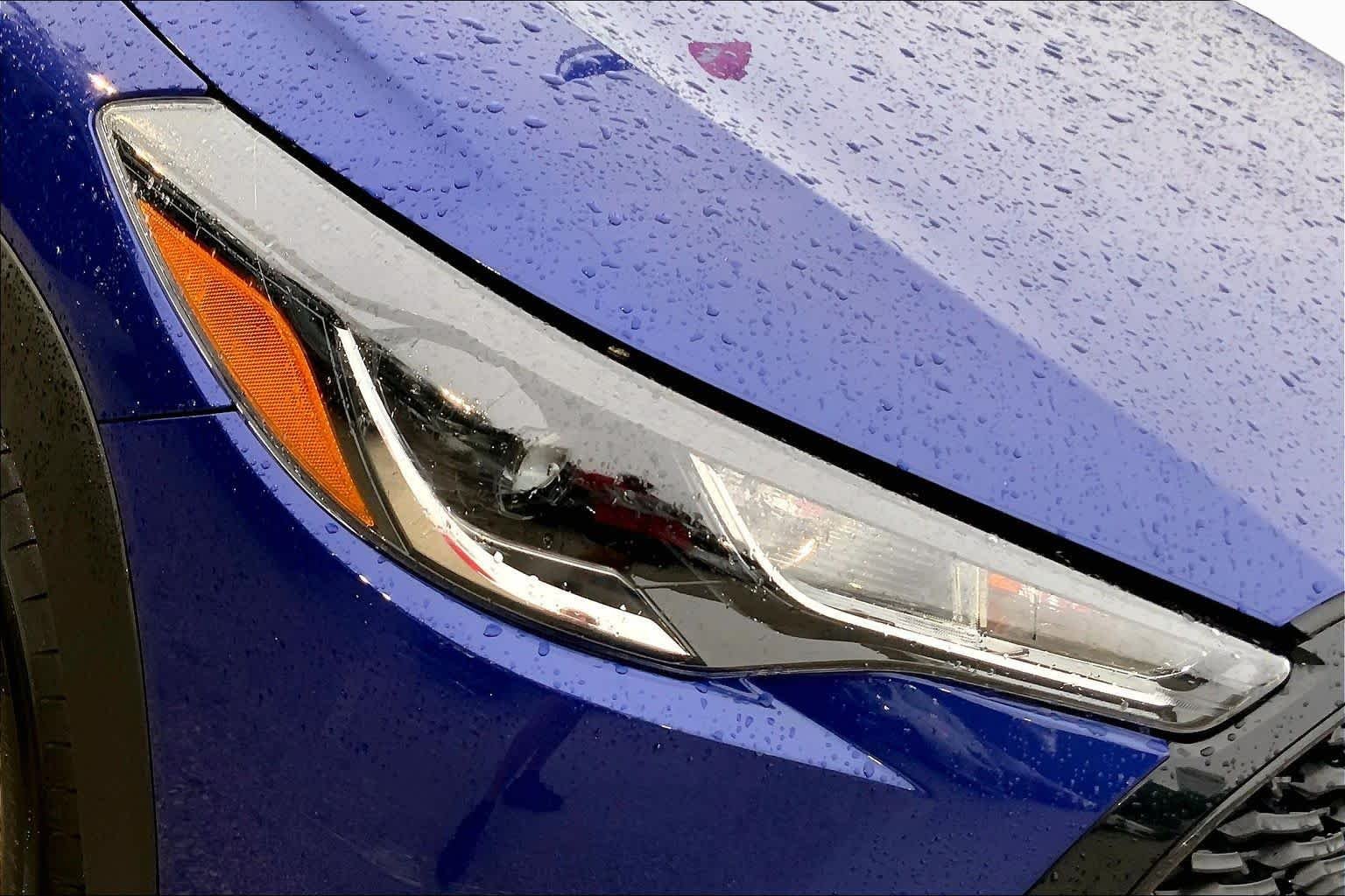Used 2024 Blue Crush Metallic Toyota LE image 28