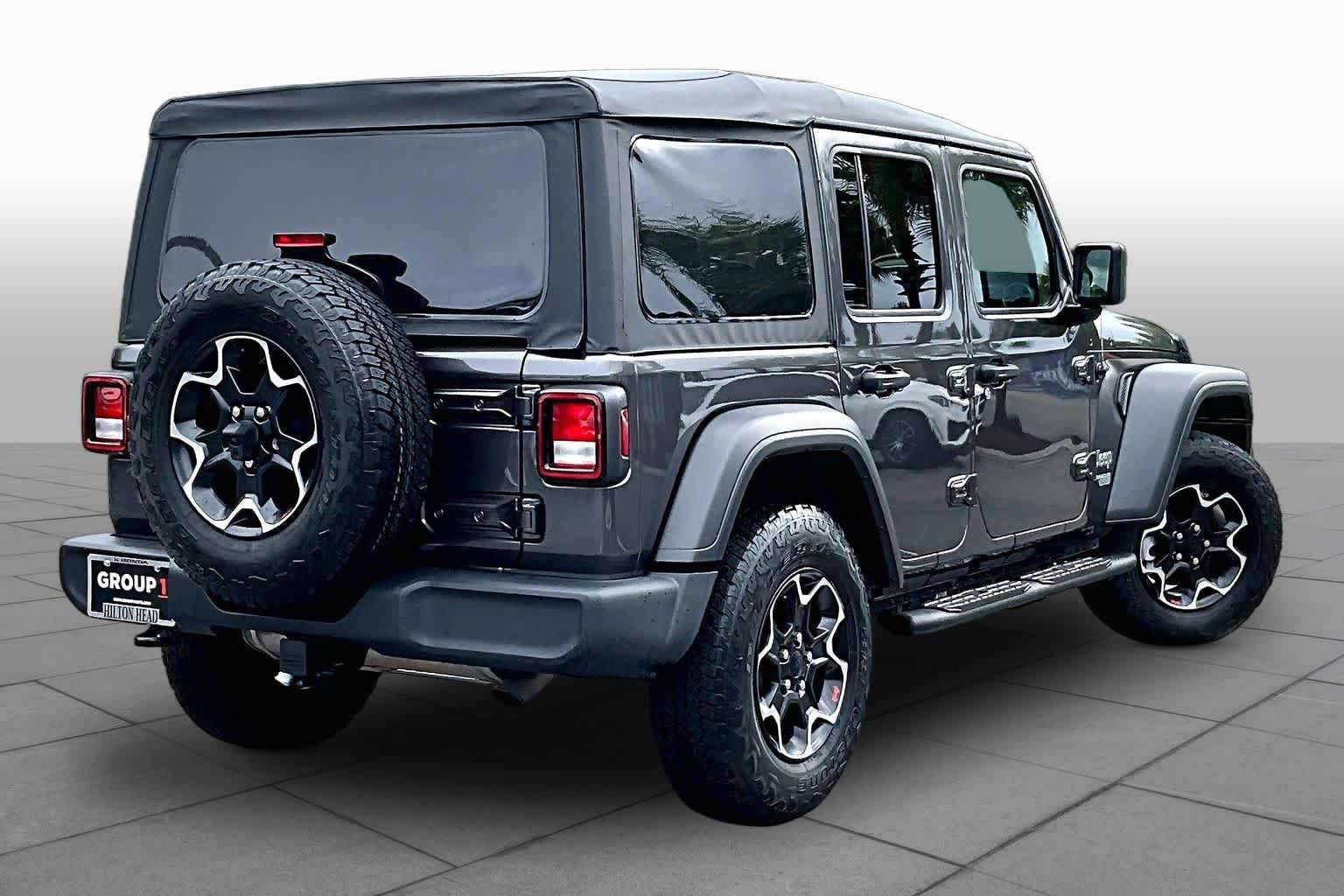 Used 2021 Granite Crystal Metallic Clearcoat Jeep Unlimited Sport S image 12