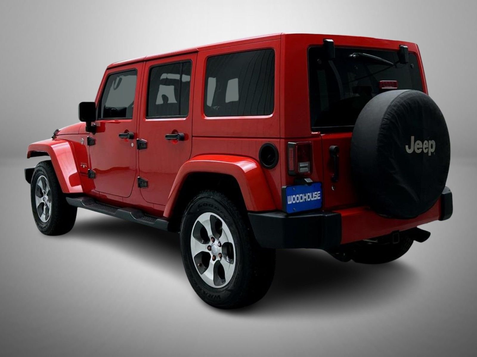 Used 2016 Red Jeep Unlimited Sahara image 7
