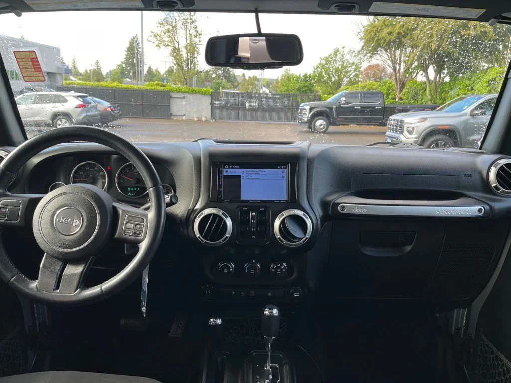 Used 2018 Silver Jeep Unlimited Sahara image 13