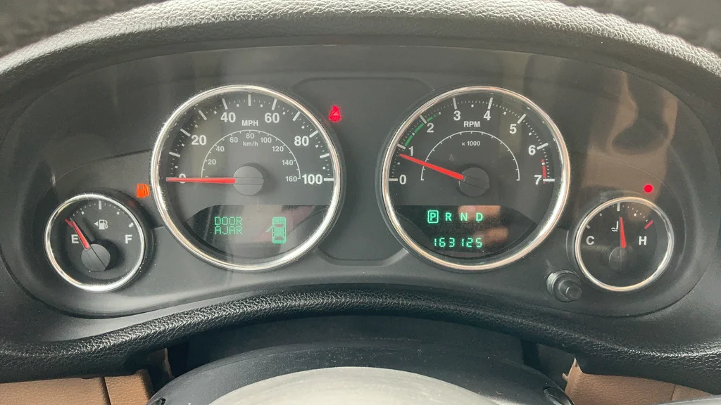 Used 2012 Black Jeep Unlimited Sahara image 12