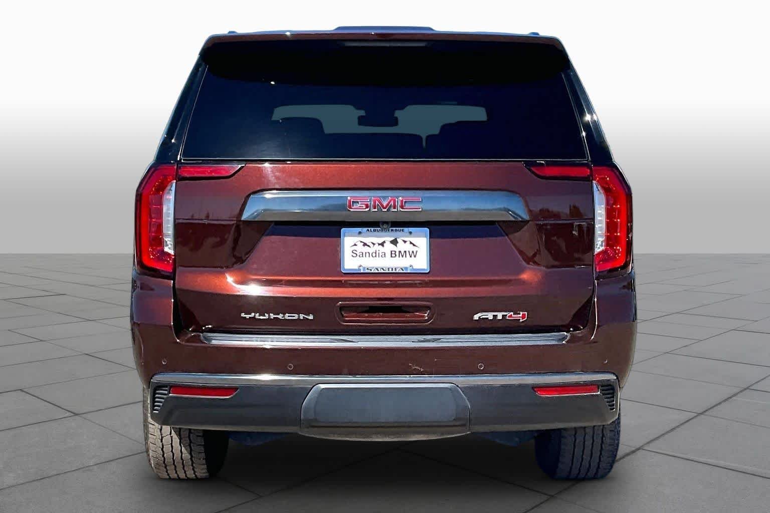 Used 2023 Redwood Metallic GMC AT4 image 4