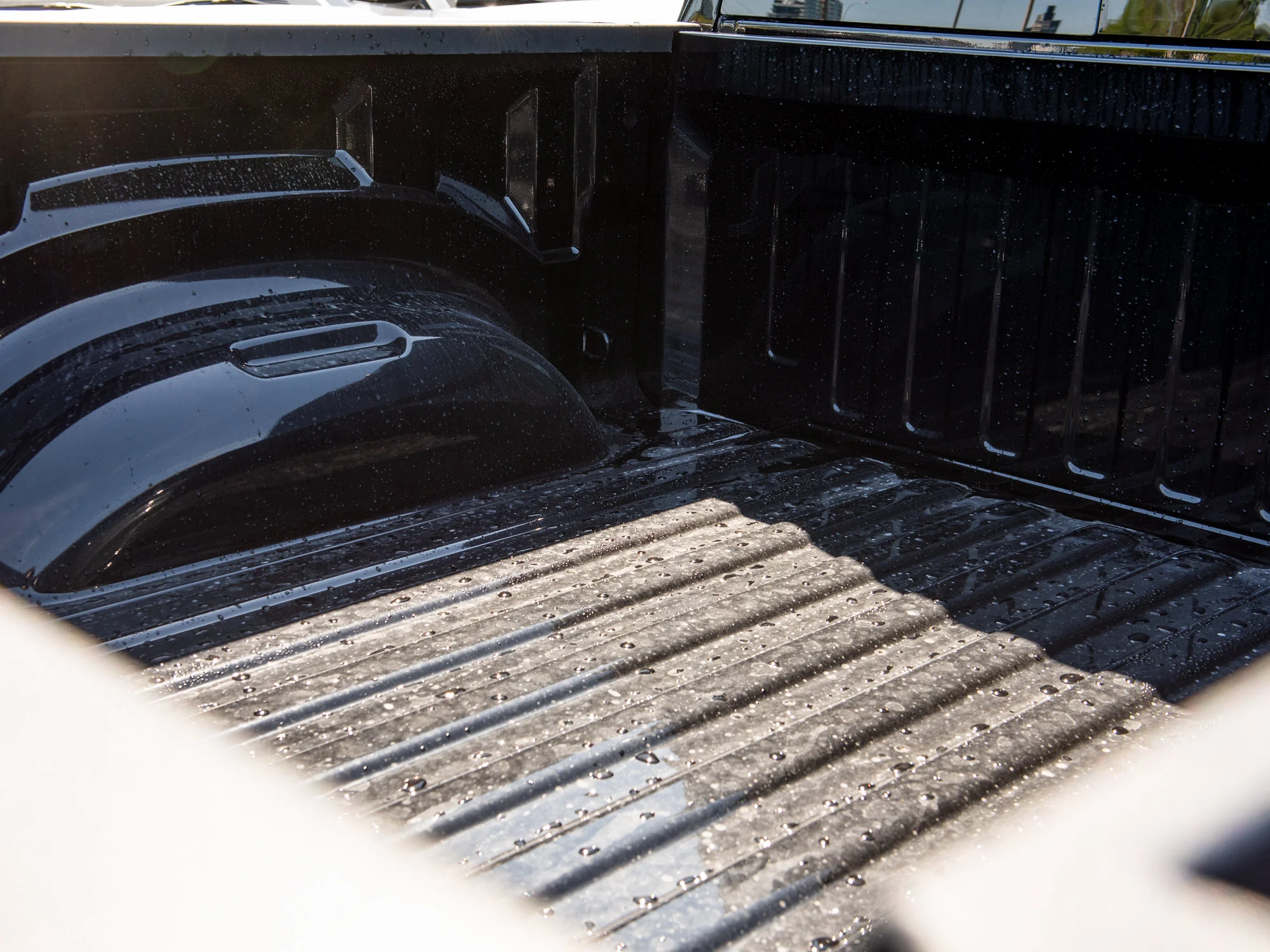 New 2026 Black RAM Rebel* Crew Cab 4x4, 33 Inch A/T Tires, Pano Sunroof, Passenger Screen image 9