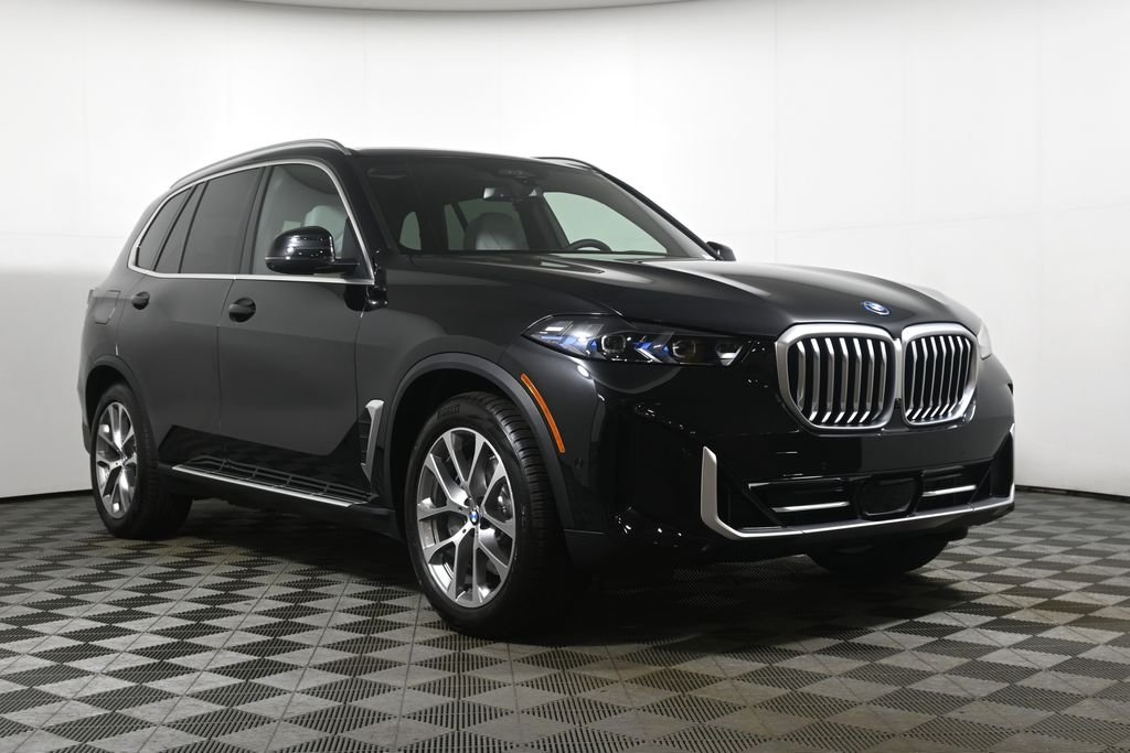 New 2026 Black Sapphire Metallic BMW xDrive50e image 9