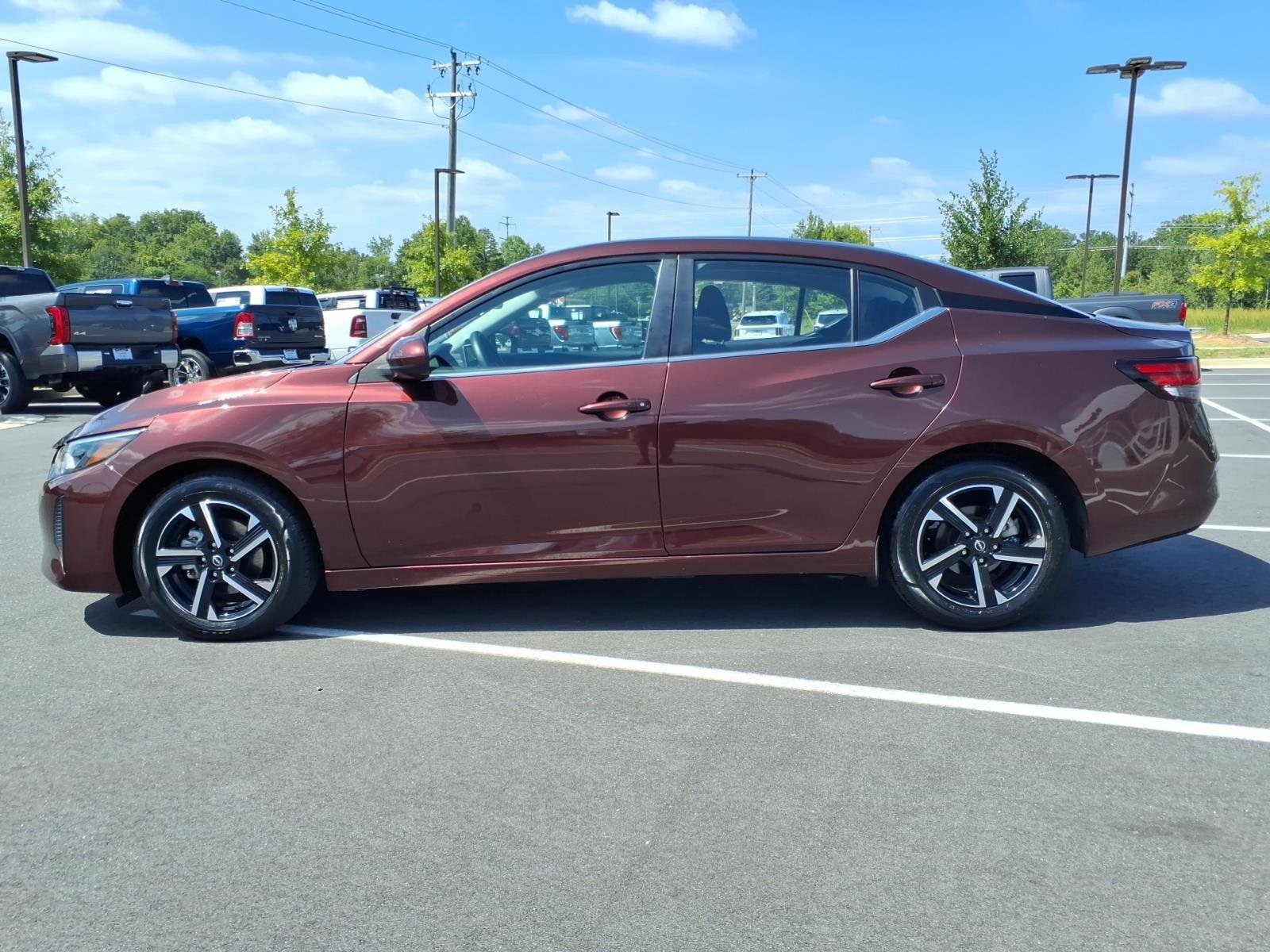 Used 2025 Rosewood Metallic Nissan SV image 3