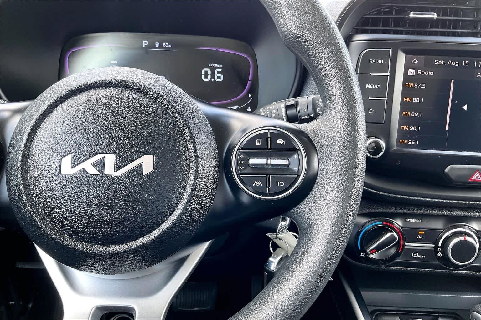Used 2023 Snow White Pearl Kia LX image 24