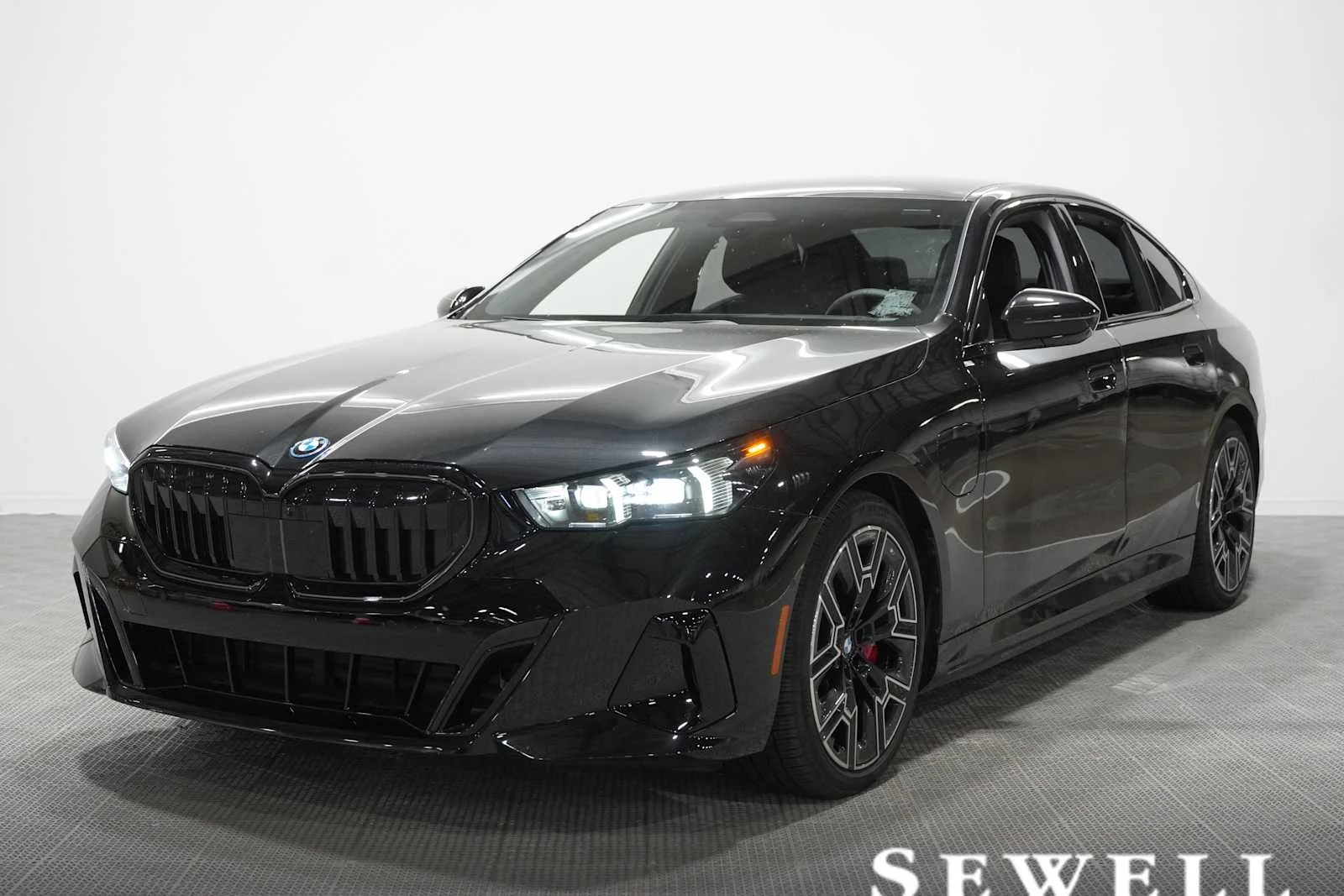 2026 BMW 5 Series 550e xDrive Sedan's photo