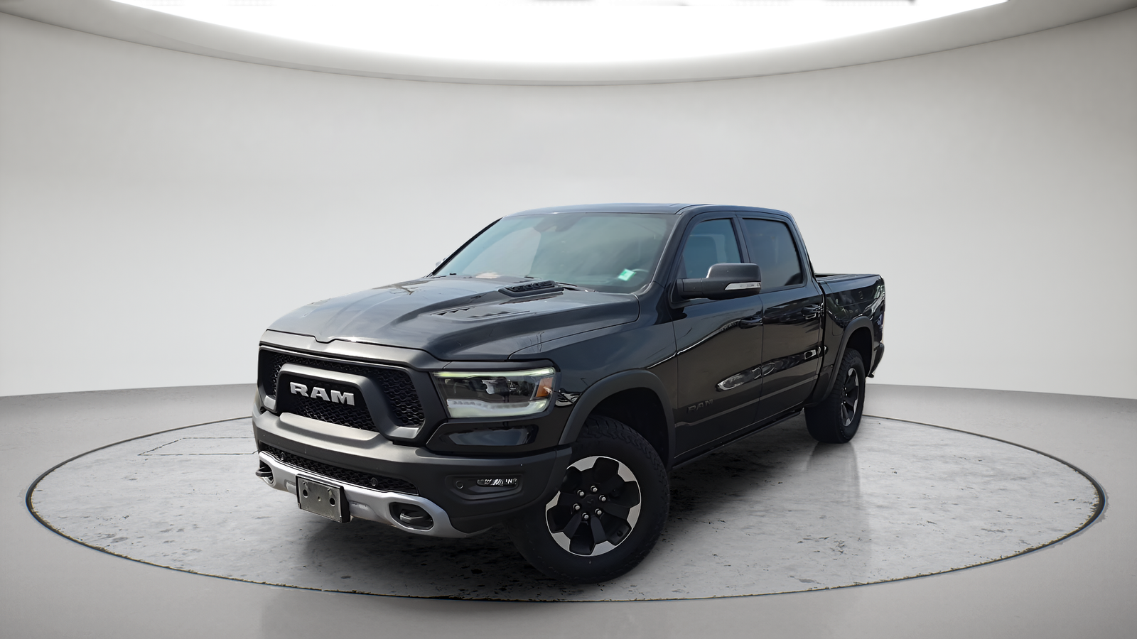 Used 2021 Diamond Black Ram Rebel image 1