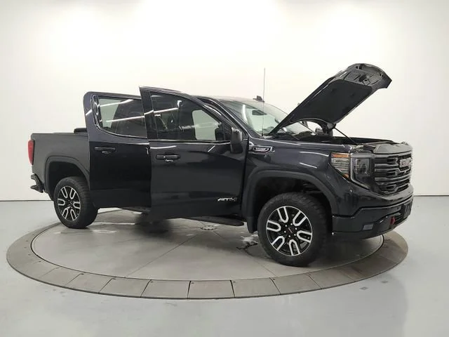 Used 2023 Titanium Rush Metallic GMC AT4 image 9