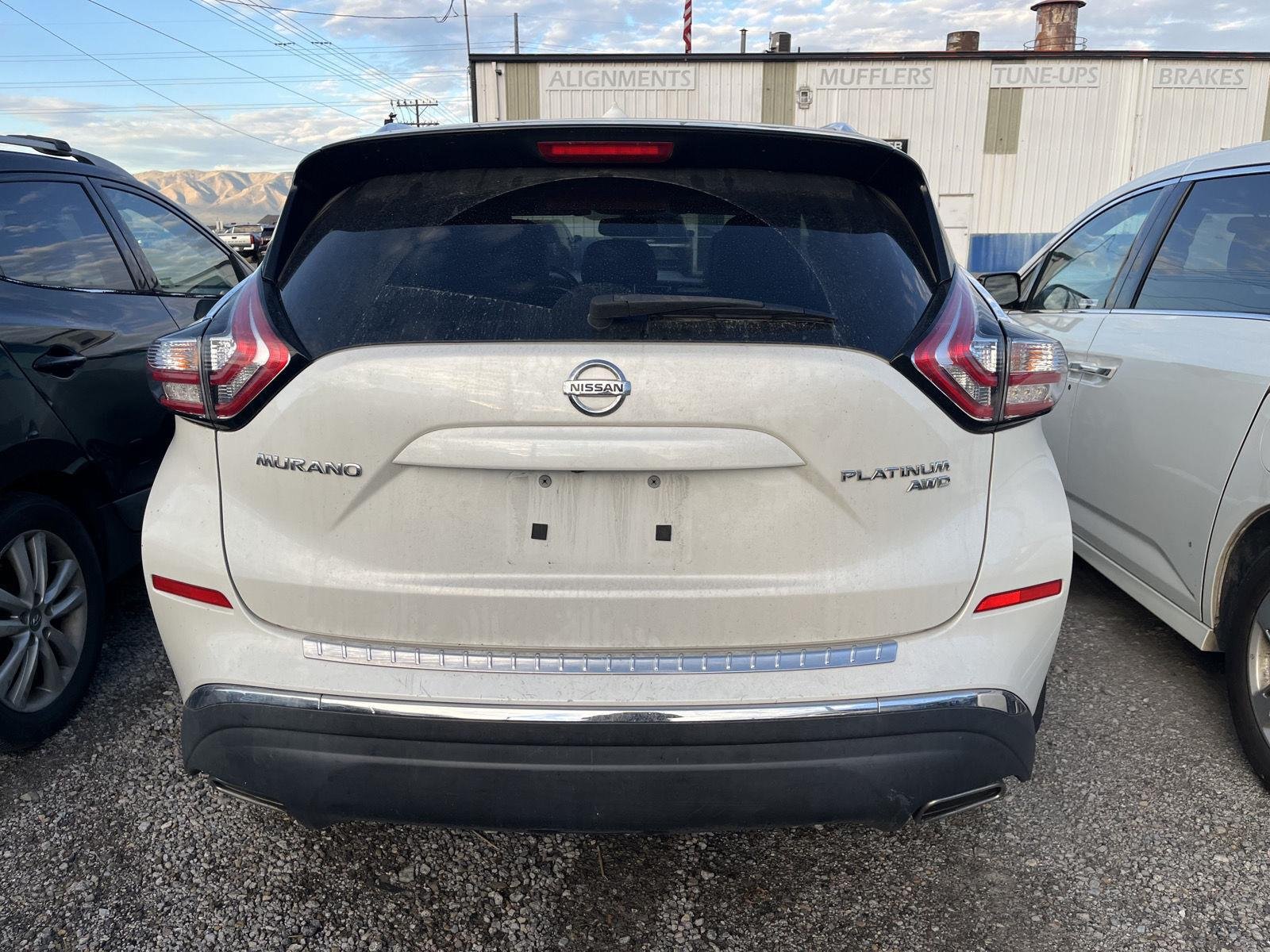 Used 2015 Pearl White Nissan Platinum image 5