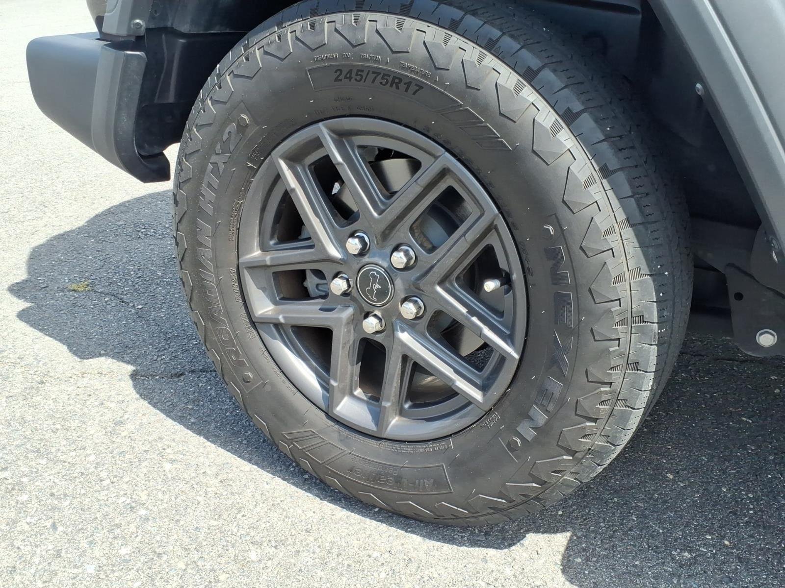 Used 2024 Granite Crystal Metallic Clearcoat Jeep Sport S image 12