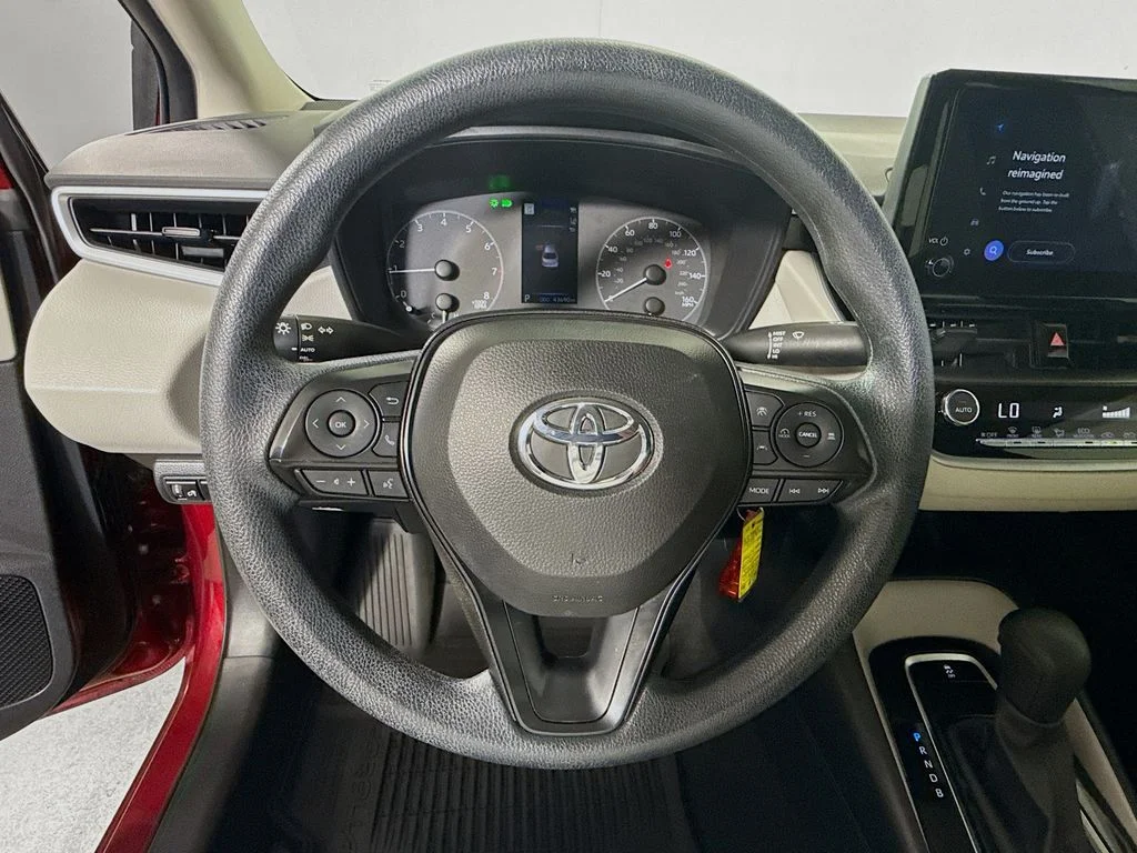 Certified Used 2023 Ruby Flare Pearl Toyota LE image 11