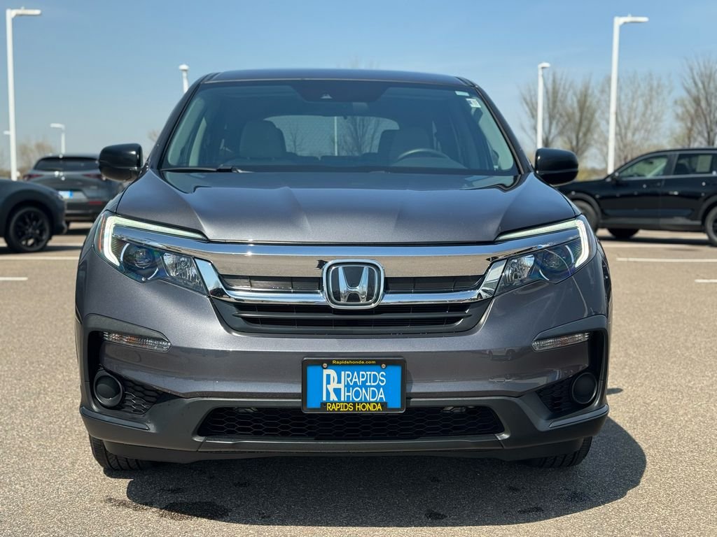 Used 2020 Honda Pilot LX with VIN 5FNYF6H1XLB001549 for sale in Coon Rapids, Minnesota