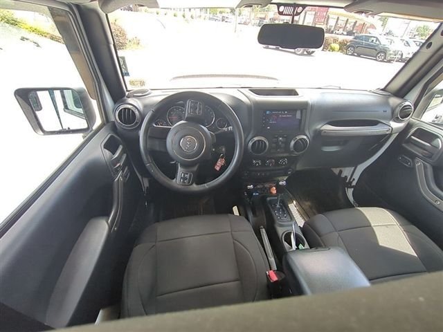 Used 2016 White Jeep Unlimited Sport image 12