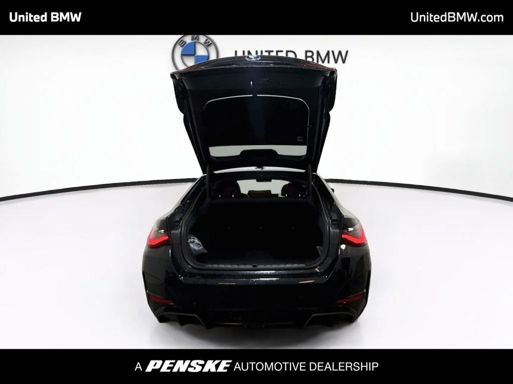Certified Used 2025 Black Sapphire Metallic BMW eDrive40 image 14