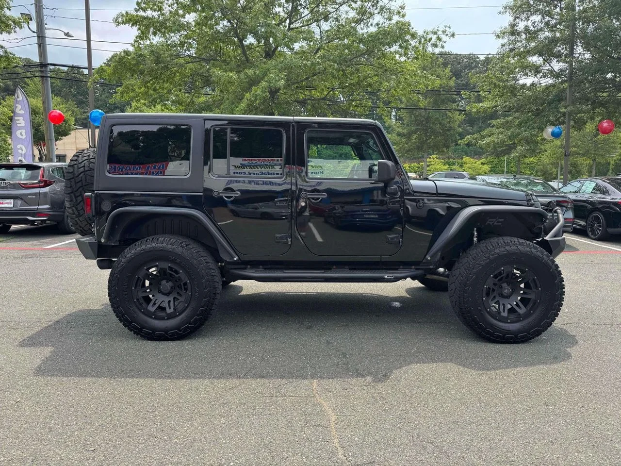 Used 2015 Black Clearcoat Jeep Sport image 9
