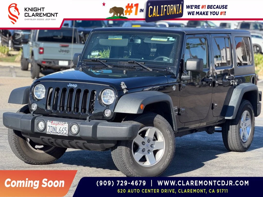 Used 2014 Black Jeep Unlimited Sport image 1
