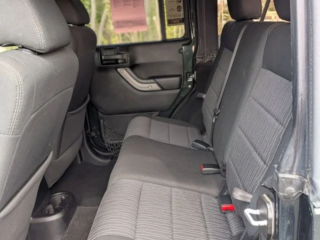 Used 2011 Green Jeep Unlimited Sport image 26