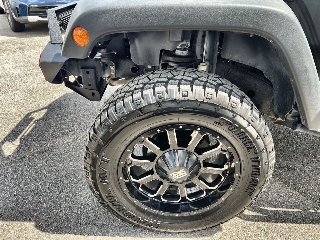 Used 2015 Black Jeep Unlimited Sport image 10