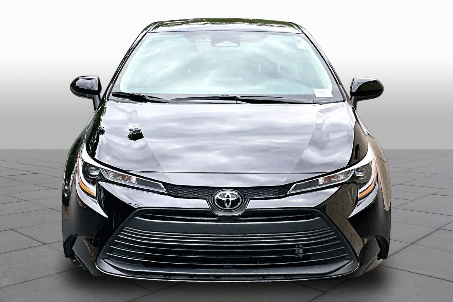 Used 2025 Midnight Black Metallic Toyota LE image 4