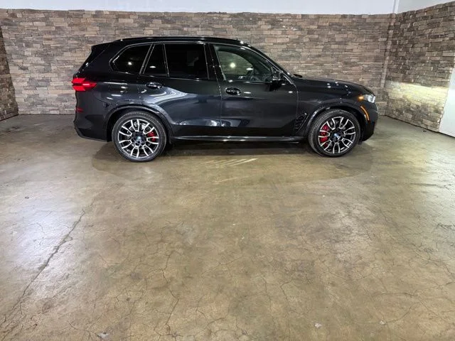 Used 2025 Black Sapphire Metallic BMW xDrive50e image 4