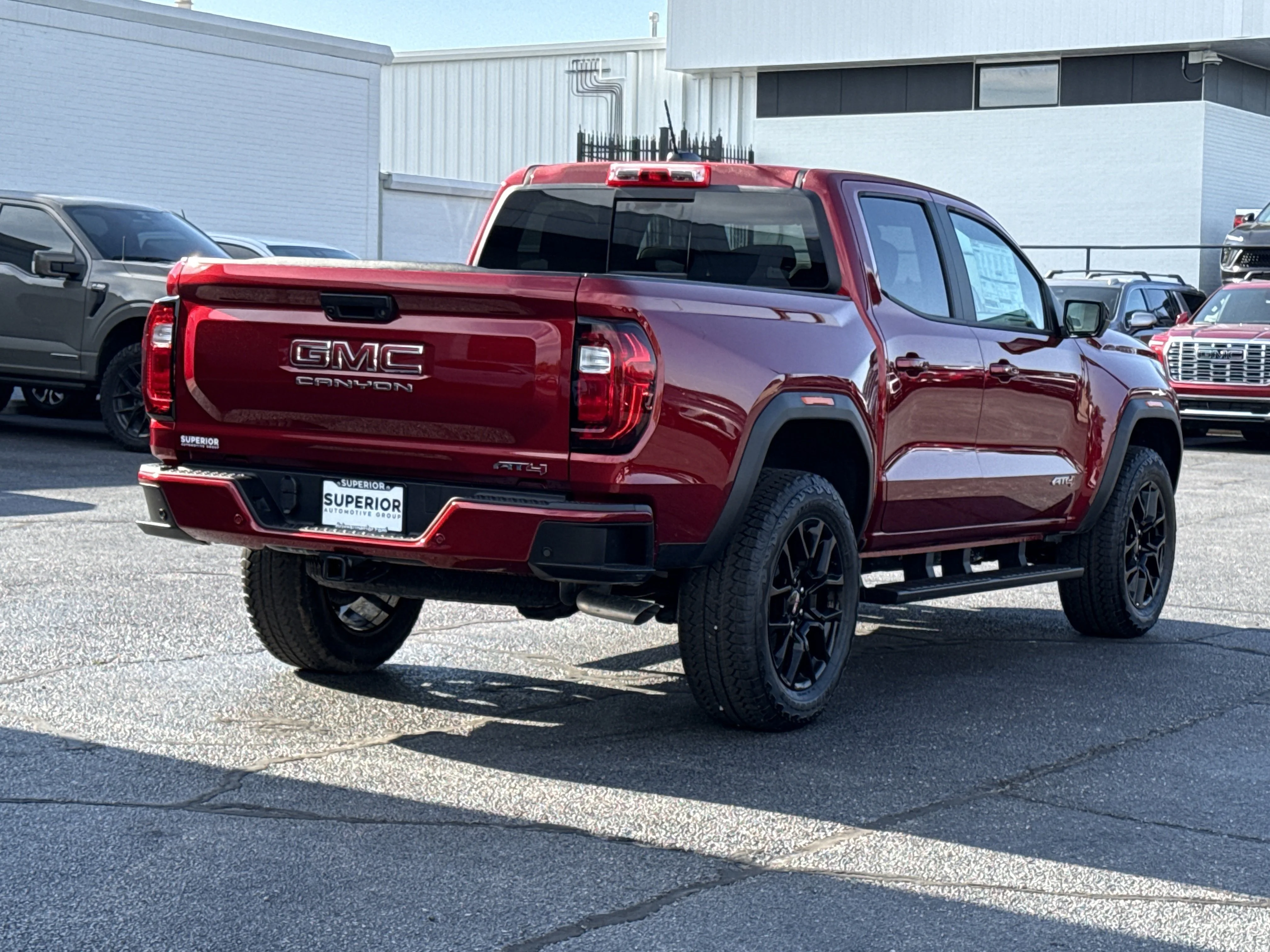 New 2026 Volcanic Red Tintcoat GMC 4WD AT4 image 3