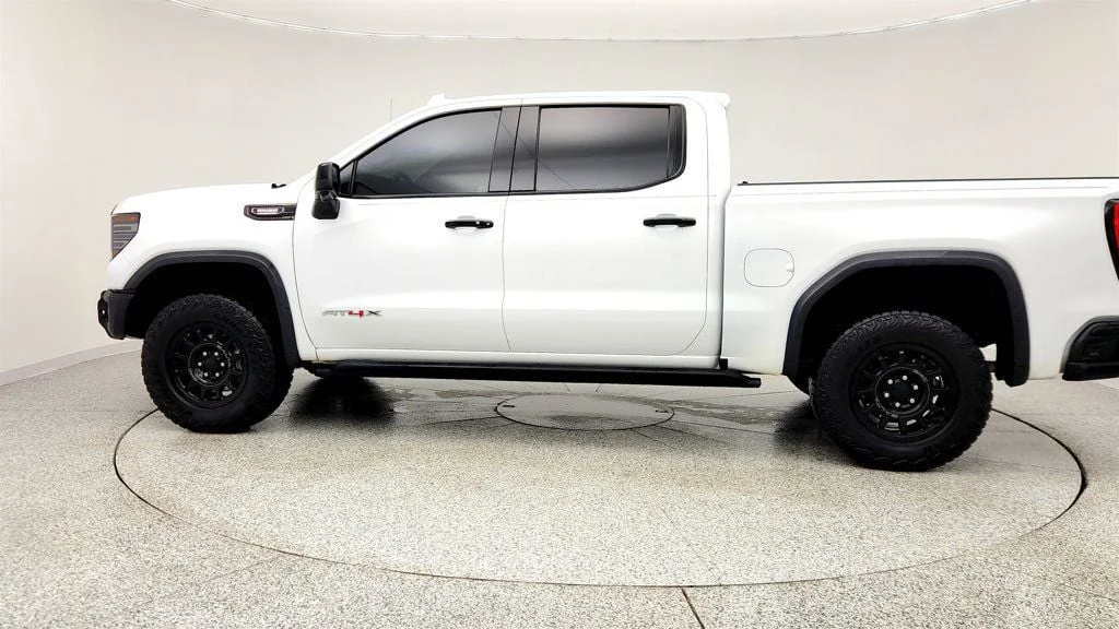 Used 2024 Summit White GMC 4WD Crew Cab 147"" AT4X image 8