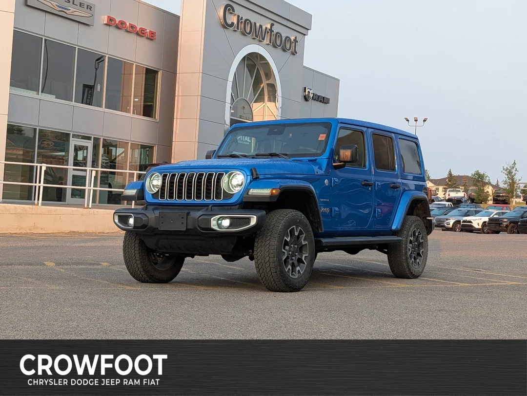 Used 2024 Blue Jeep Sahara - - 4x4 - Leather Seats - Power Soft Top - Remote Start & More! image 1