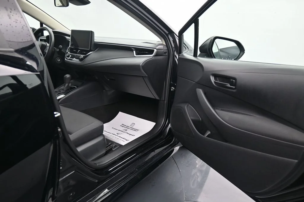 Used 2024 Black Toyota LE image 11