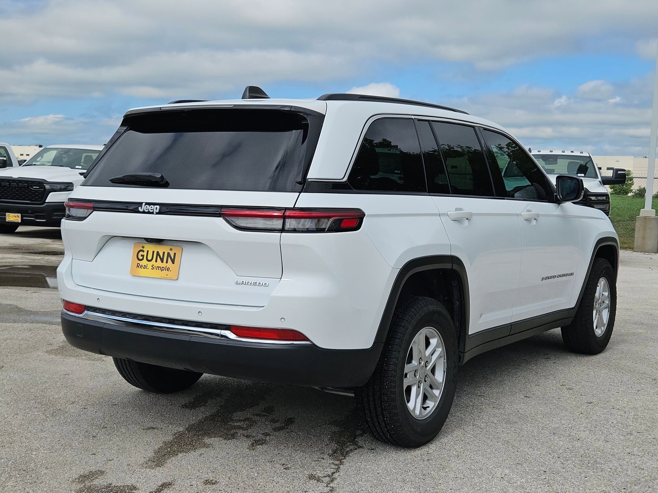 Used 2024 Bright White Clearcoat Jeep Laredo A image 3
